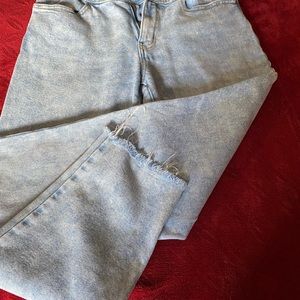 Blue jeans with two buttons and a zipper